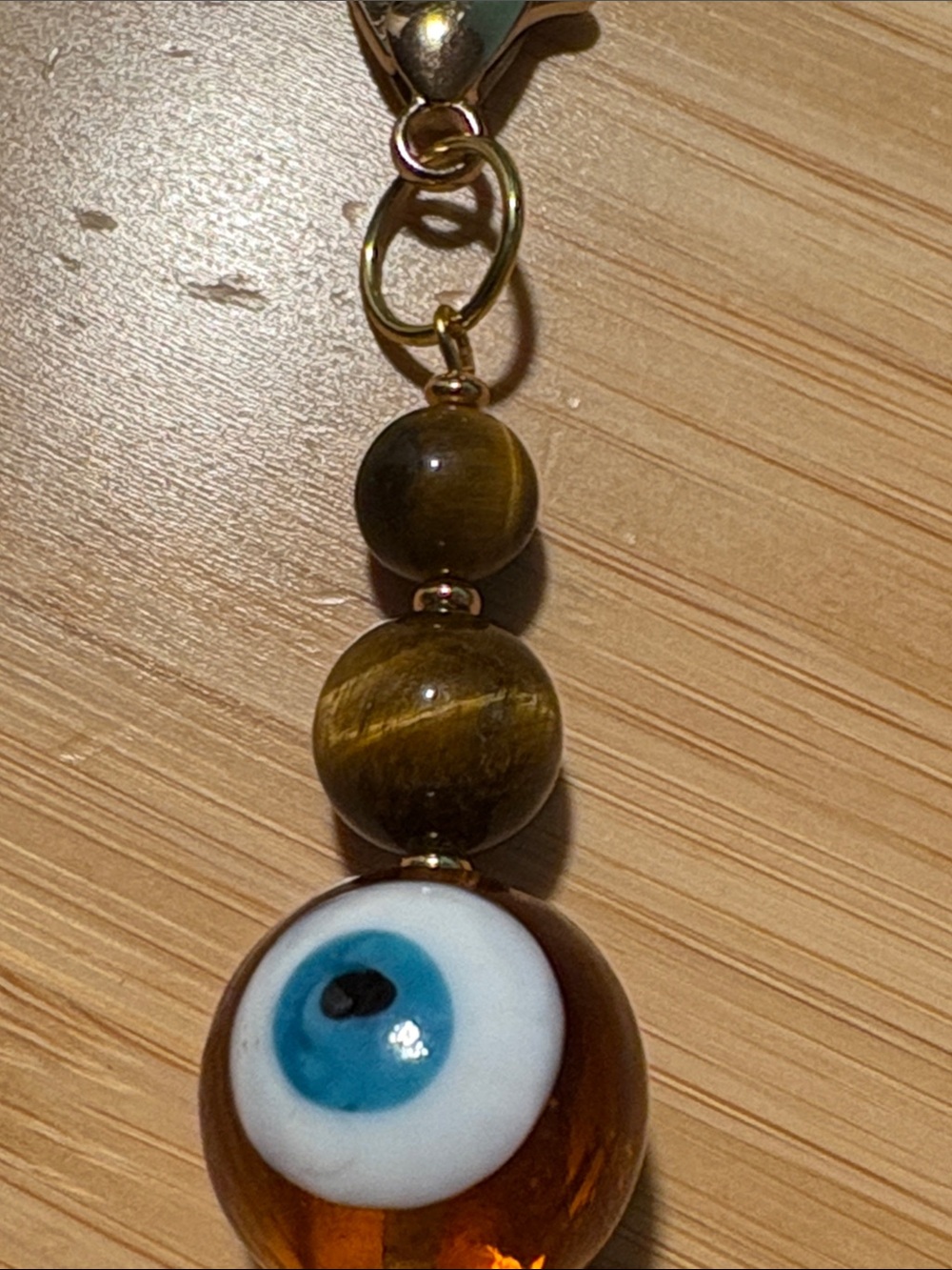 Hand Crafted Tiger’s Eye Evil Eye Glass Bead Keychain Charm in Amber & Blue - Picture 2 of 5
